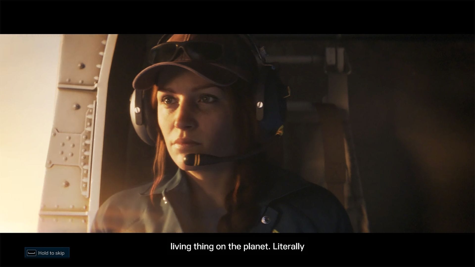 A screenshot of a woman in a helicopter in the game "Tom Clancy's Rainbow Six Extraction."