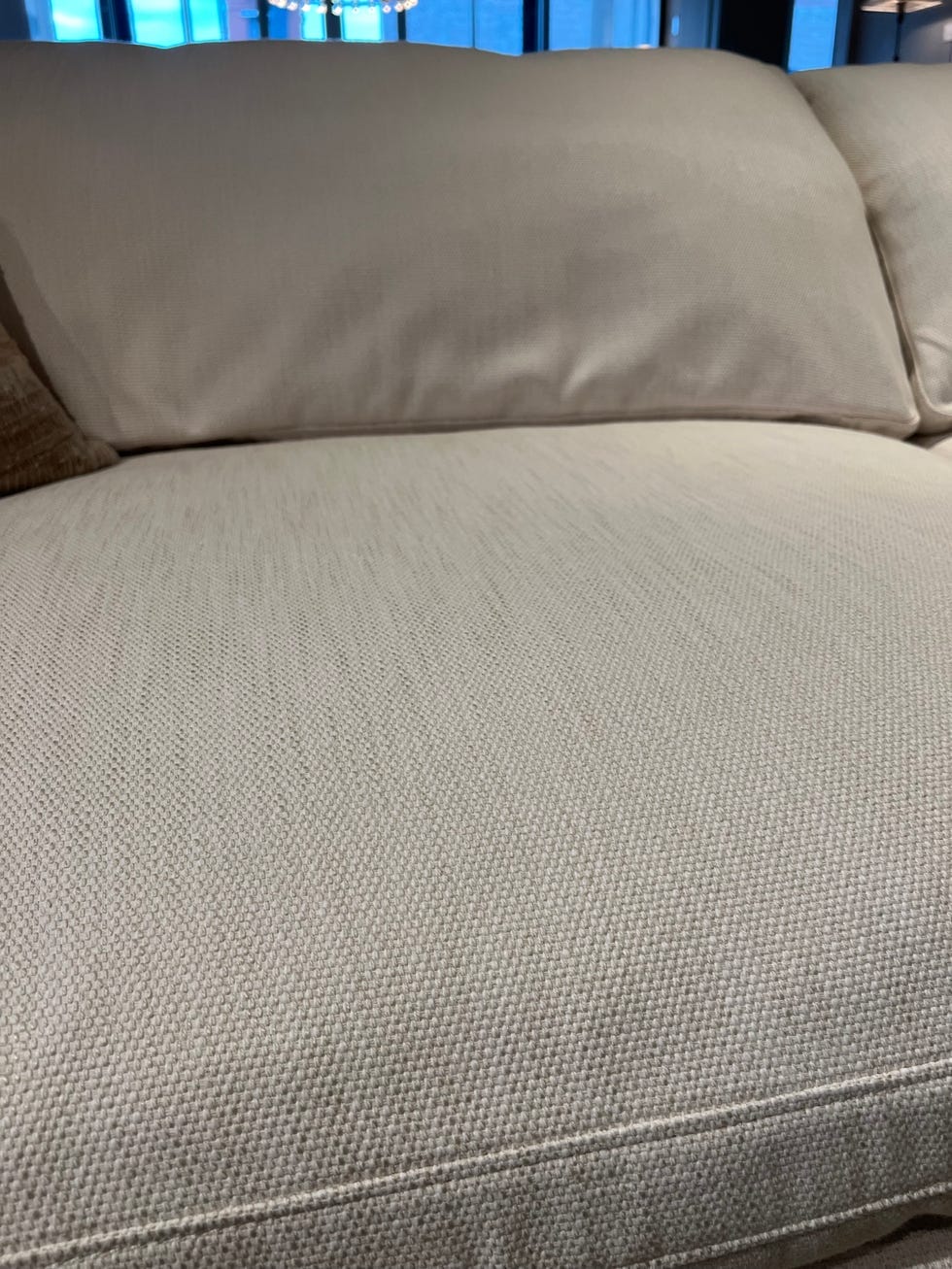 a couch with a cushion